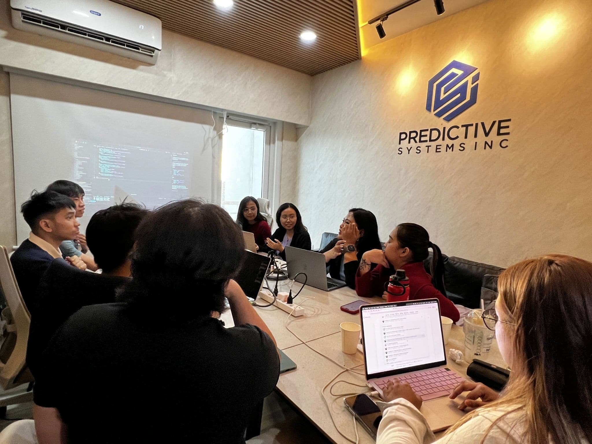 Predictive Systems team working together